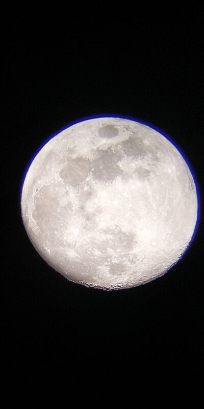 A full moon showing craters and maria in detail