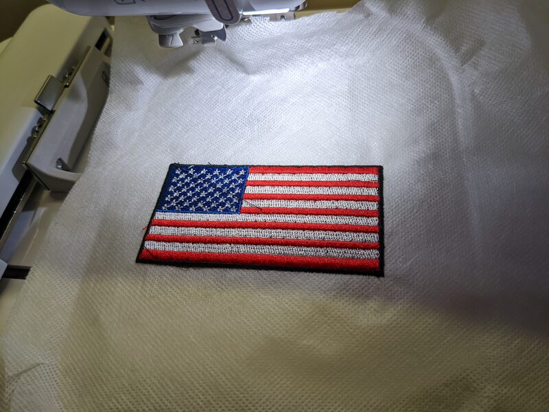 A finished American flag embroidered patch