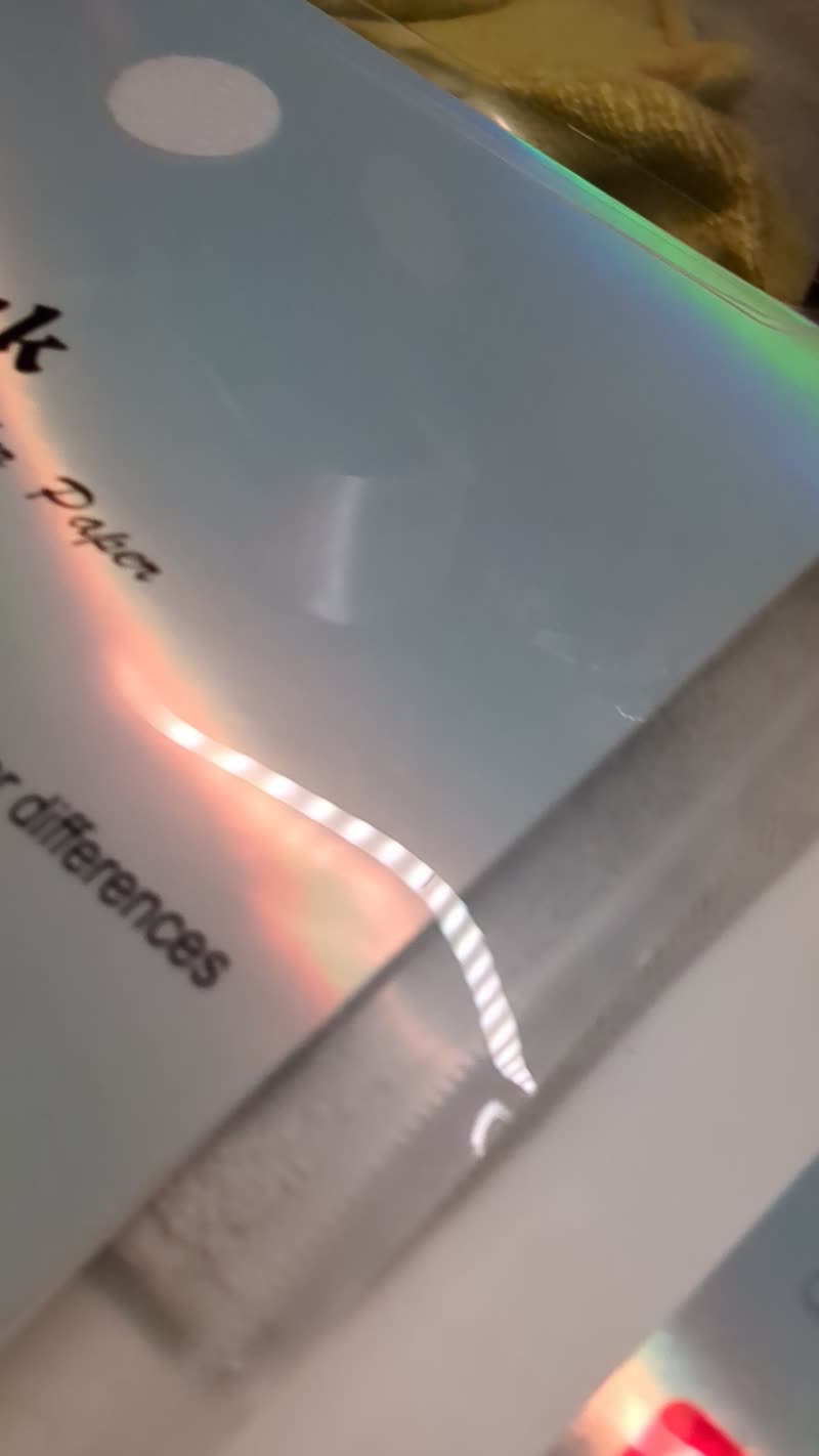 Video still of the ultra rare card making process